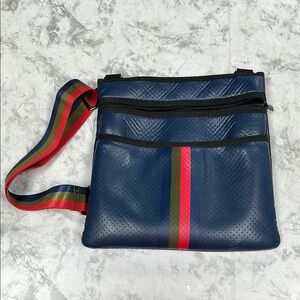 HAUTE SHORE Blue and Red Crossbody Bag with Sporty Stripe